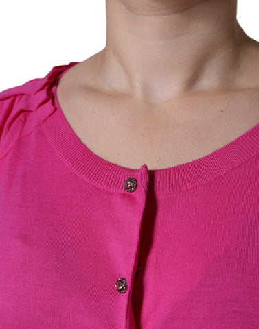Pink wool button-down short sleeve blouse top by Dolce & Gabbana, featuring a tailored fit and elegant design.