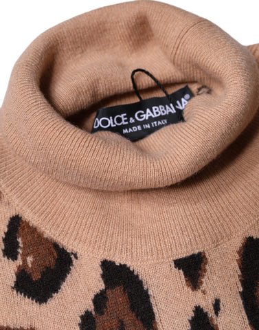 Beige leopard print wool turtleneck top by Dolce & Gabbana, showing close-up of fabric and collar detail.