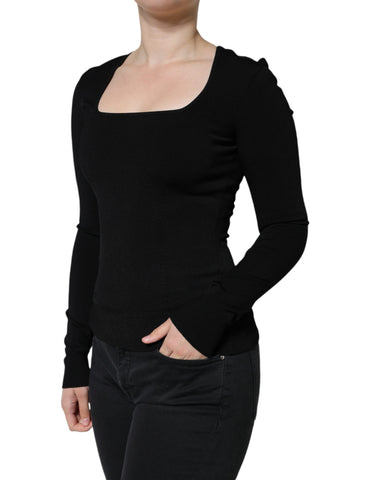 Black long sleeve blouse with square neckline by Dolce & Gabbana, shown with detailed fabric and elegant fit.