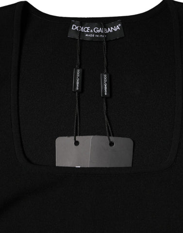Black Dolce & Gabbana long sleeve blouse with square neckline, featuring a stylish, fitted design and elegant fabric.