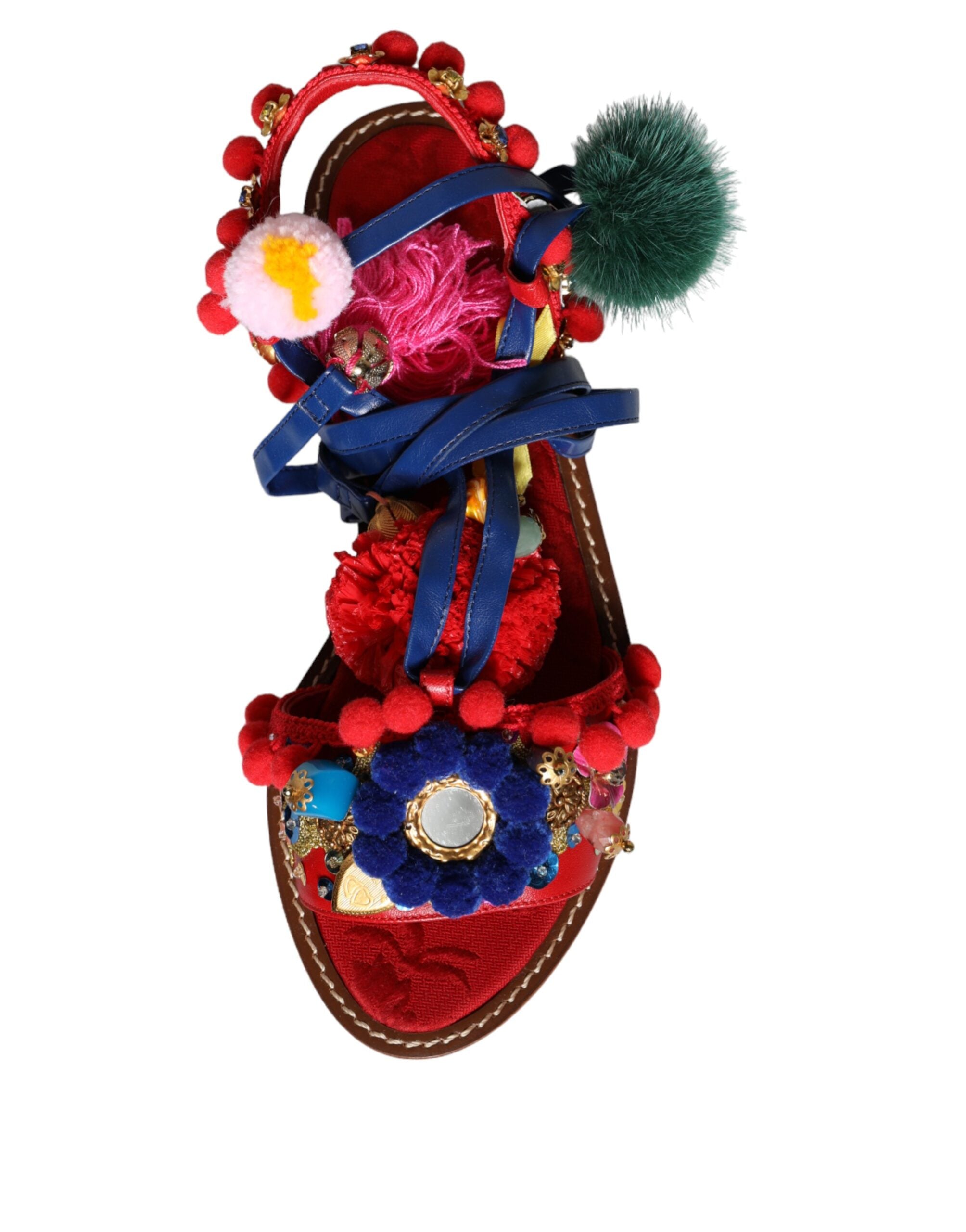 Dolce & Gabbana multicolor pom pom fur wrap sandals with decorative fur pom poms and open-toe design.