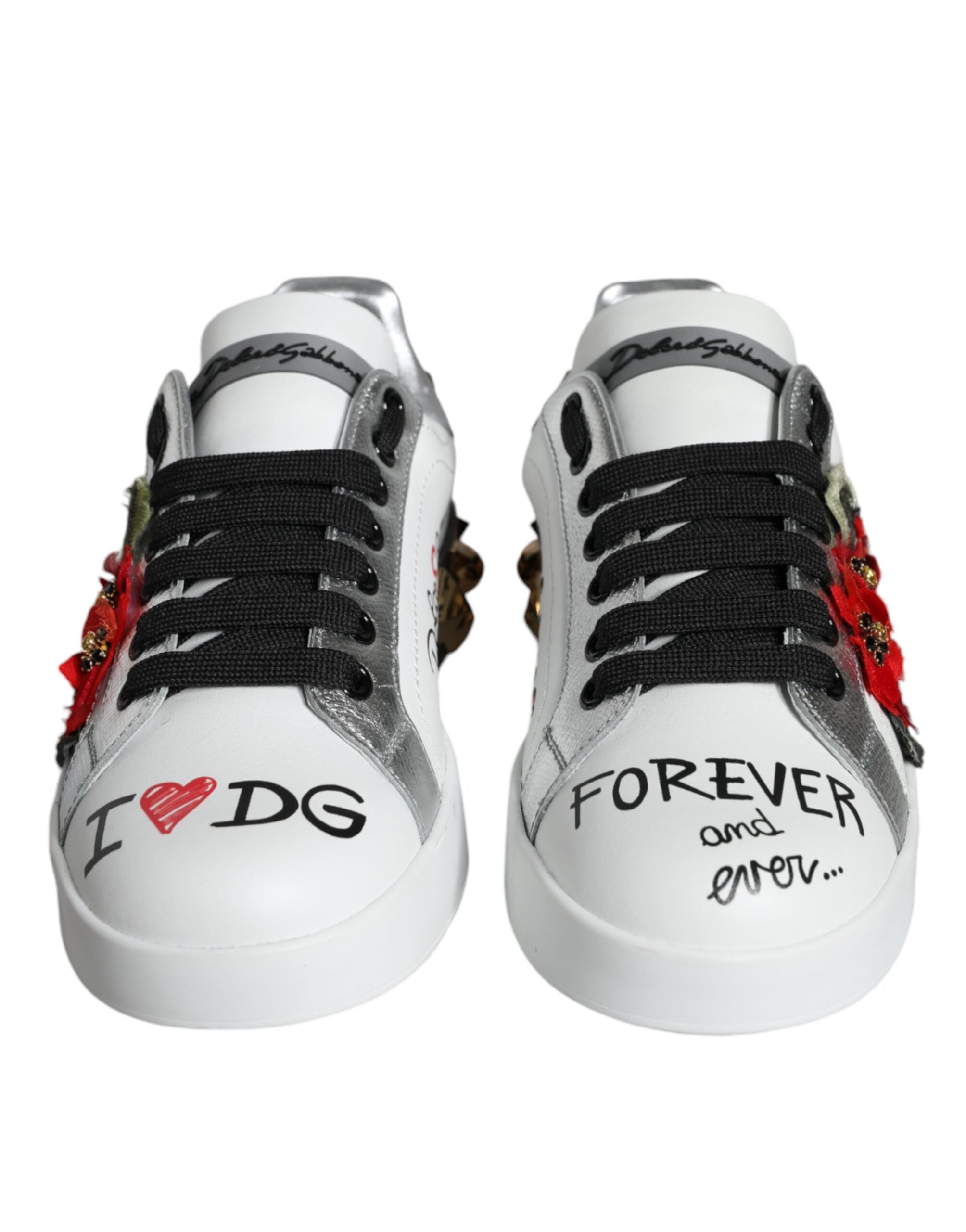 White leather floral studded sneakers from Dolce & Gabbana, featuring a stylish design with decorative floral details and studs.