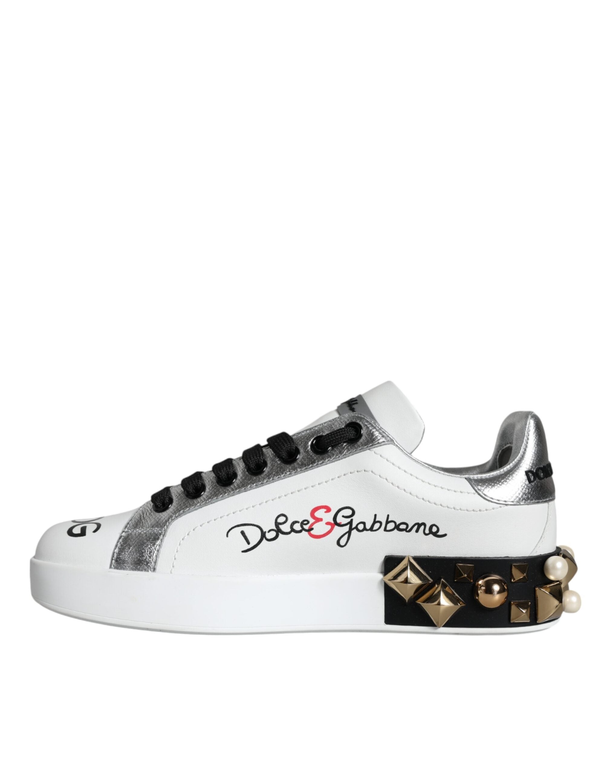 White leather floral studded sneakers by Dolce & Gabbana, featuring decorative floral accents and a casual sporty design.