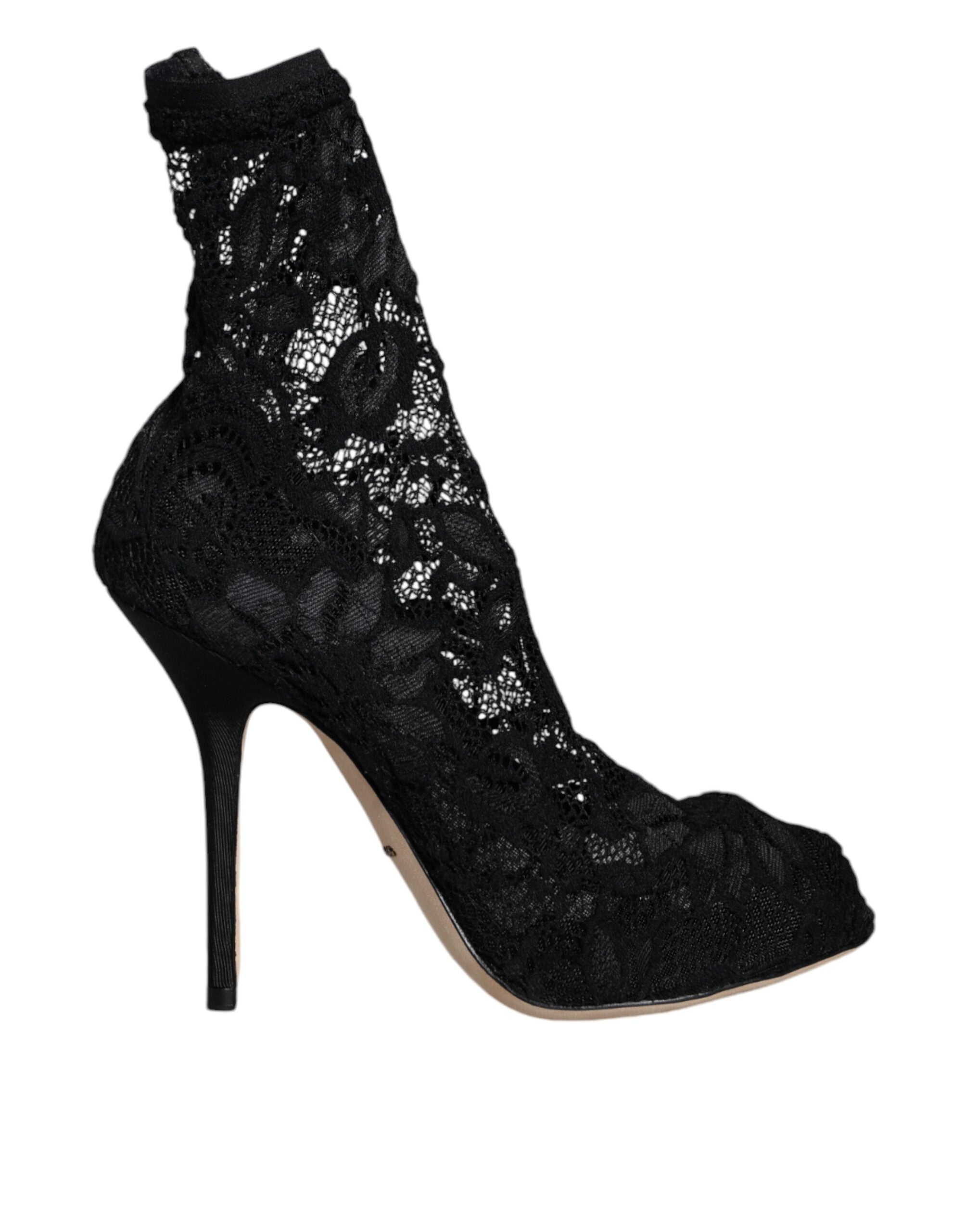 Black lace stretch heel boots with mid-calf height from Dolce & Gabbana featuring elegant design and pointed toe details.