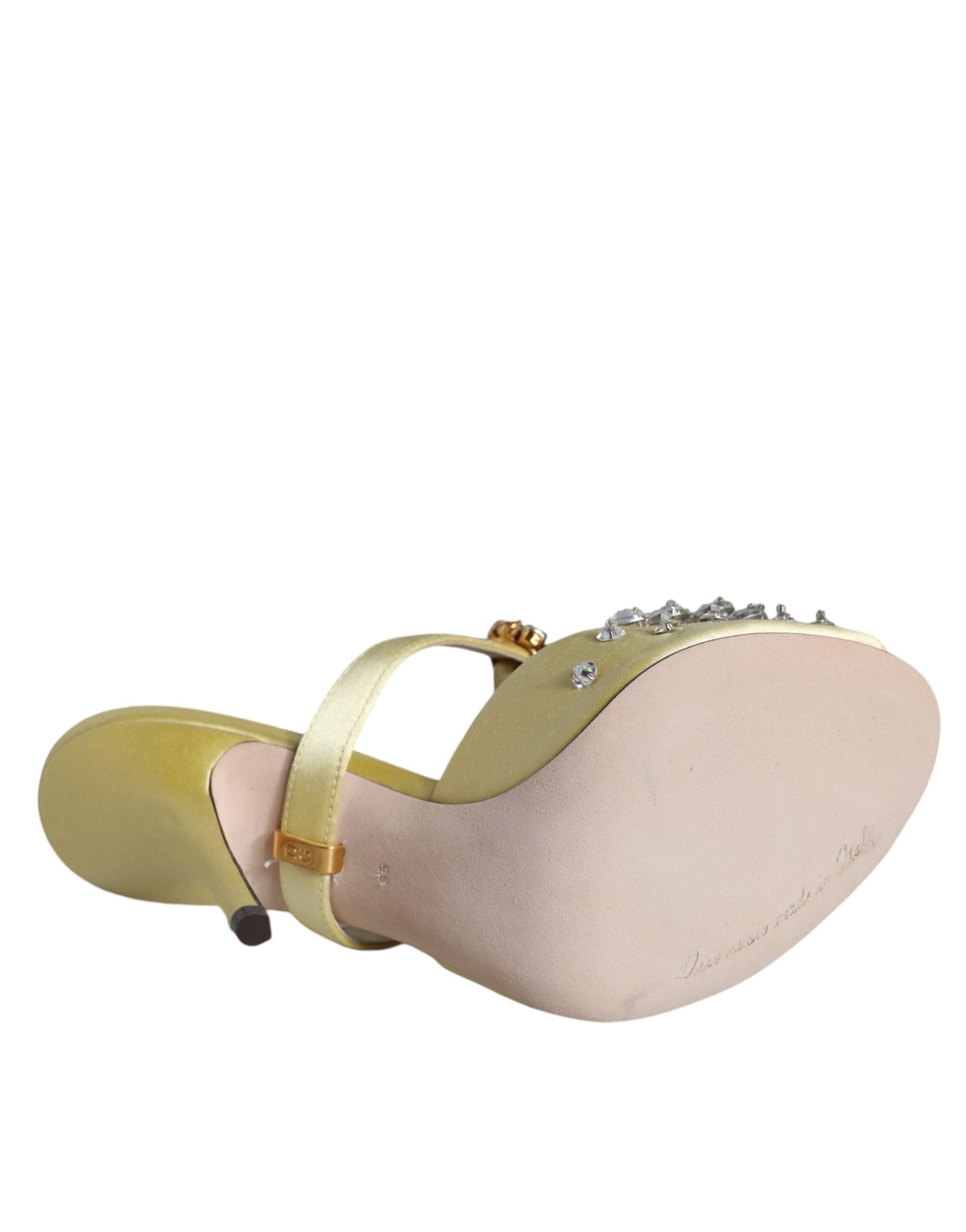 Yellow satin Mary Janes shoes with crystal embellishments from Dolce & Gabbana, featuring a classic style and glossy finish.