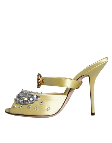 Yellow satin Mary Janes sandals with crystal embellishments from Dolce & Gabbana, featuring a classic strap and elegant design.