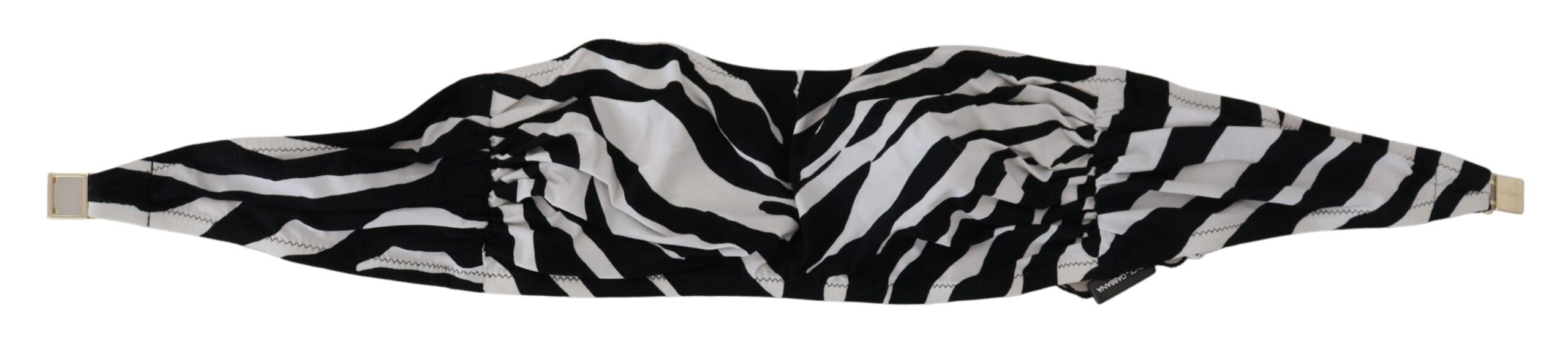 Black and white zebra print Dolce & Gabbana bandeau swimwear bikini top with strapless design and bold pattern.