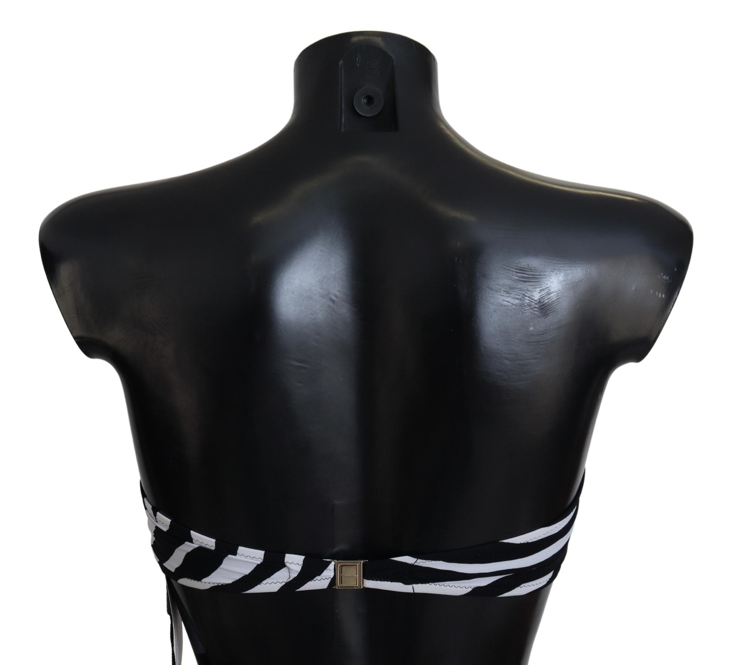 Black and white zebra print bandeau bikini top by Dolce & Gabbana, featuring a sleek swimwear design for beach or pool.
