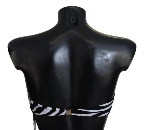 Black and white zebra print bandeau bikini top by Dolce & Gabbana, featuring a sleek swimwear design for beach or pool.
