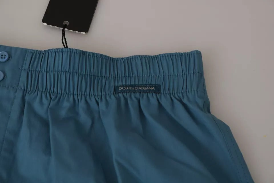 Blue cotton regular boxer shorts underwear by Dolce & Gabbana, showing the soft fabric and comfortable fit on a model.