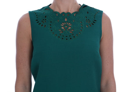 Green floral cutout silk wool dress by Dolce & Gabbana, featuring a fitted silhouette and intricate floral floral pattern.
