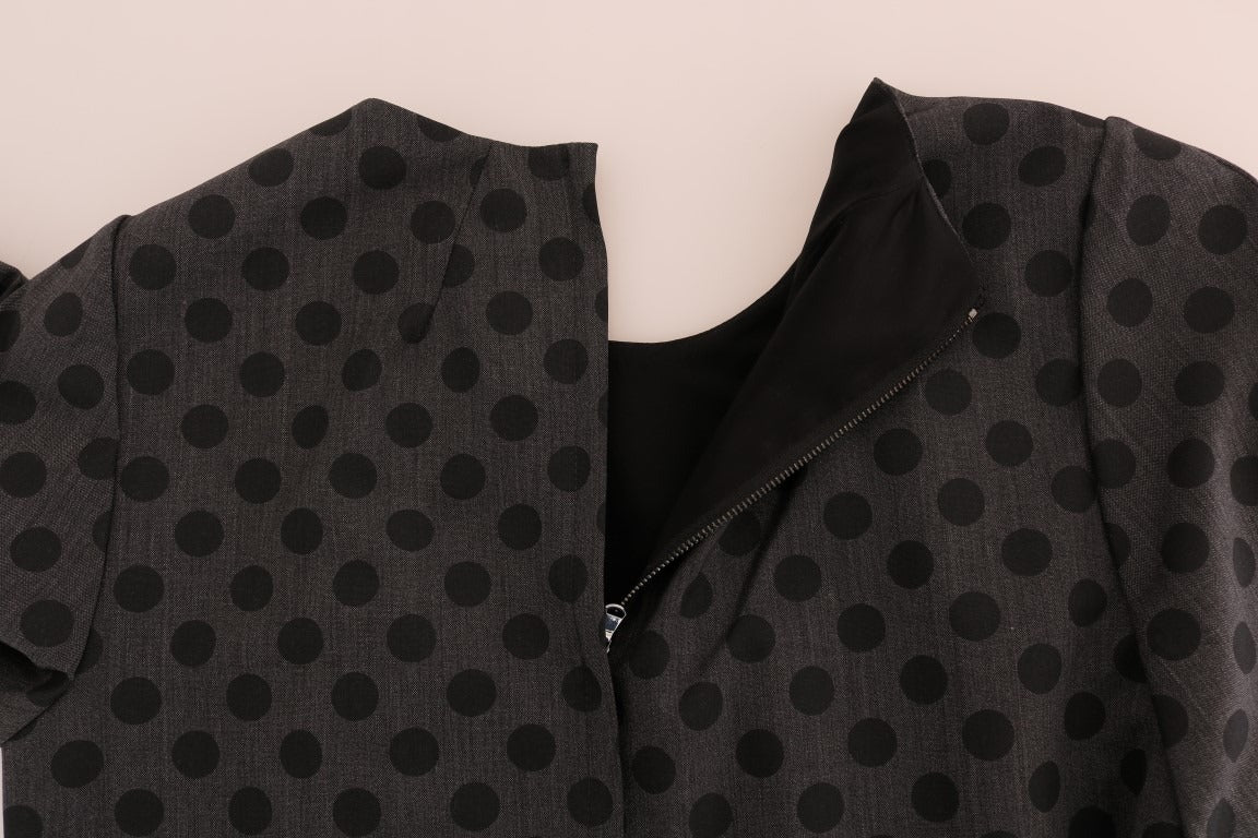 Gray polka dotted wool stretch dress by Dolce & Gabbana, featuring a fitted silhouette and elegant design.