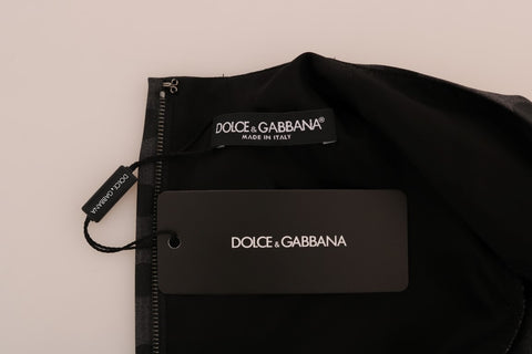 Gray polka dotted wool stretch dress by Dolce & Gabbana, featuring a fitted silhouette and classic pattern.