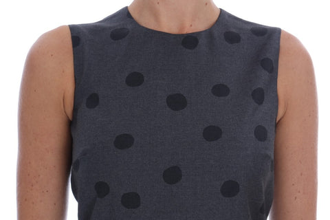 Gray polka dotted sheath wool dress by Dolce & Gabbana, fitted silhouette with long sleeves and classic round neckline.