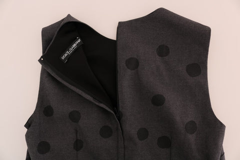 Gray polka dotted wool sheath dress by Dolce & Gabbana, close-up of tailored fit and classic design.