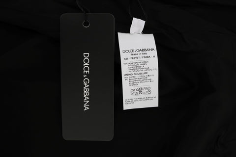 Gray polka dotted sheath wool dress by Dolce & Gabbana, featuring a fitted silhouette and classic pattern.