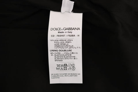 Gray polka dotted wool sheath dress by Dolce & Gabbana, featuring a fitted silhouette and classic round neckline.