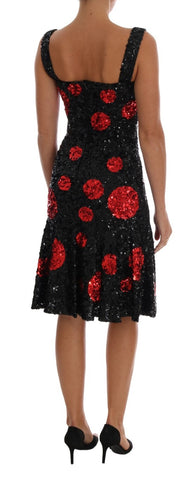 Black and red polka sequined shift dress by Dolce & Gabbana with a fitted silhouette and vibrant polka dot pattern.