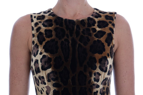 Brown leopard print silk sheath dress by Dolce & Gabbana, showcasing a fitted design and elegant pattern.