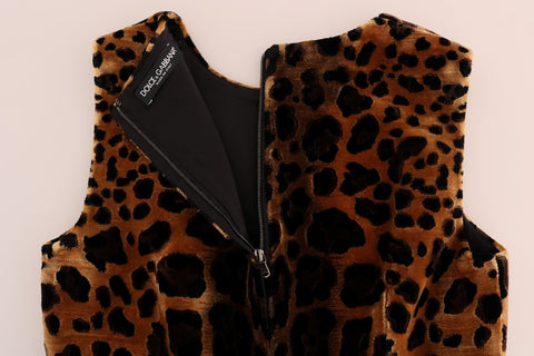 Brown leopard print silk sheath dress by Dolce & Gabbana, showing the fitted silhouette and luxurious fabric details.