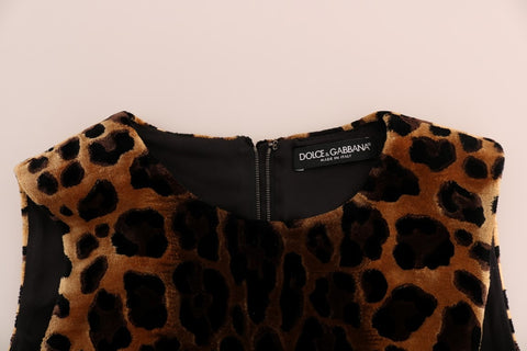 Brown leopard print silk sheath dress by Dolce & Gabbana, fitted with a sleek silhouette and stylish animal print pattern.