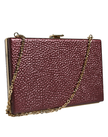 Maroon leather clutch evening crossbody bag by Dolce & Gabbana, with sleek design and gold-tone hardware.