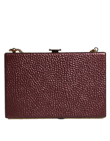 Maroon leather clutch evening crossbody bag by Dolce & Gabbana with gold-tone hardware and sleek design.