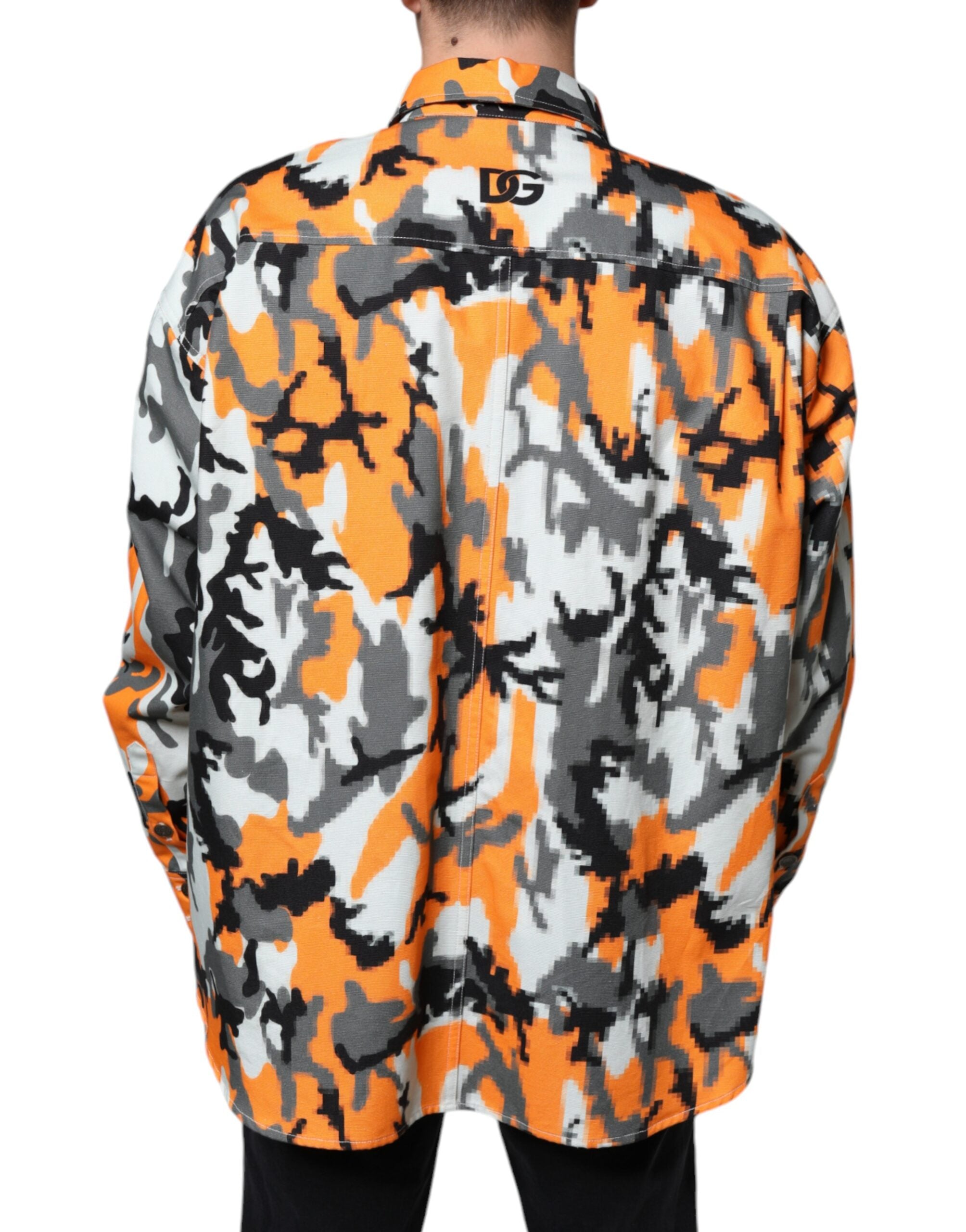 Multicolor camouflage cotton denim jacket with a collar by Dolce & Gabbana, shown on a hanger.