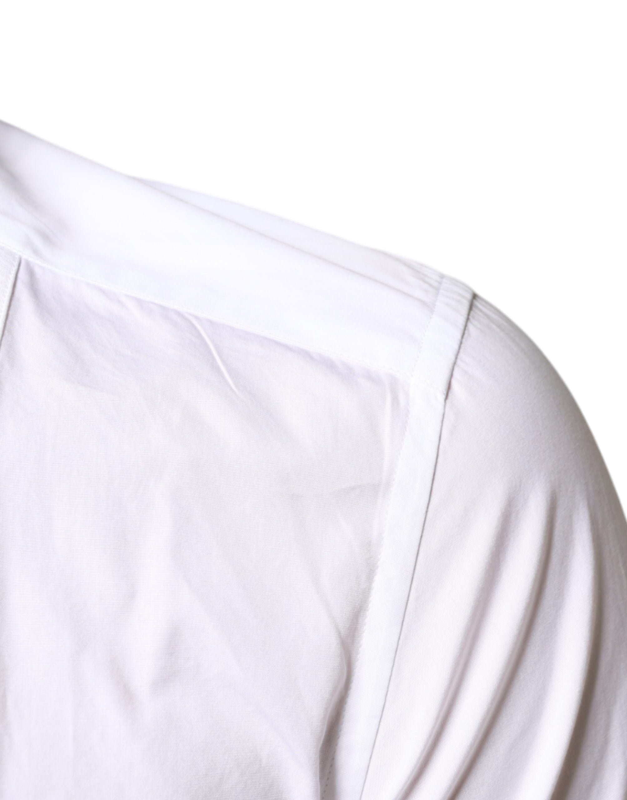White cotton poplin formal dress shirt with a classic collar and button front from Dolce & Gabbana.