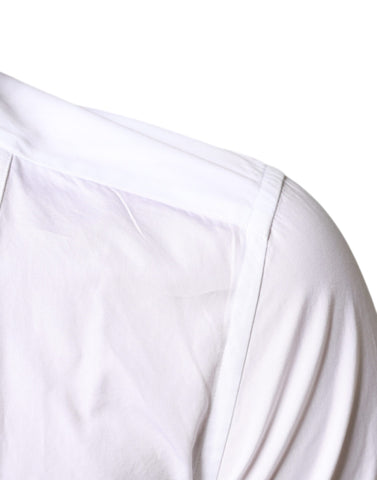 White cotton poplin formal dress shirt with a classic collar and button front from Dolce & Gabbana.