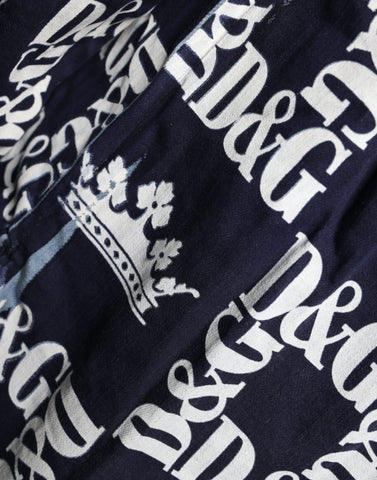 Blue slim fit cotton shirt with Dolce & Gabbana crown logo print, featuring a classic collar and button-down front.