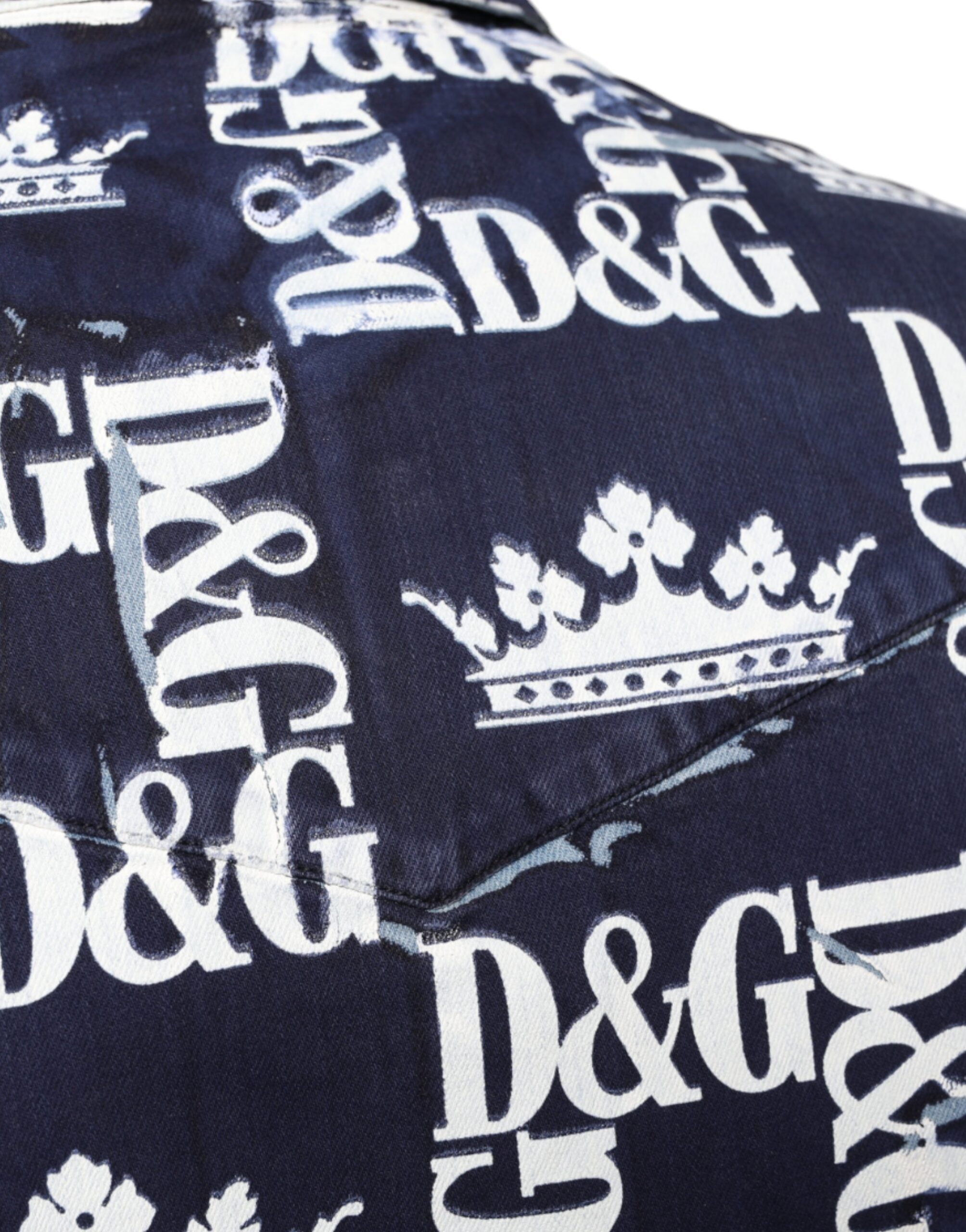 Blue slim fit cotton shirt by Dolce & Gabbana with crown logo print, shown on a hanger.