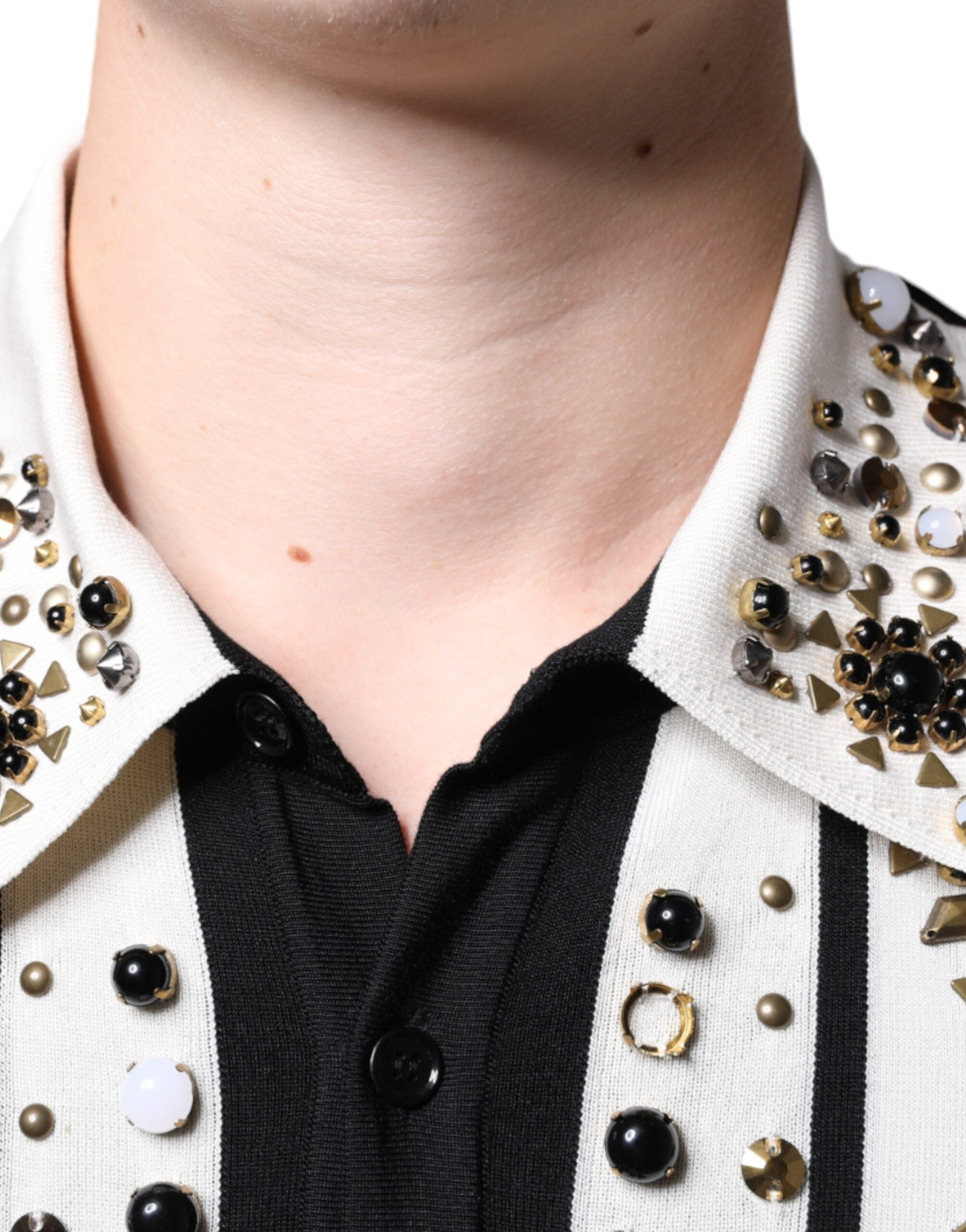 White and black silk shirt with studded stone and crystal embellishments by Dolce & Gabbana, featuring a sleek, elegant design.