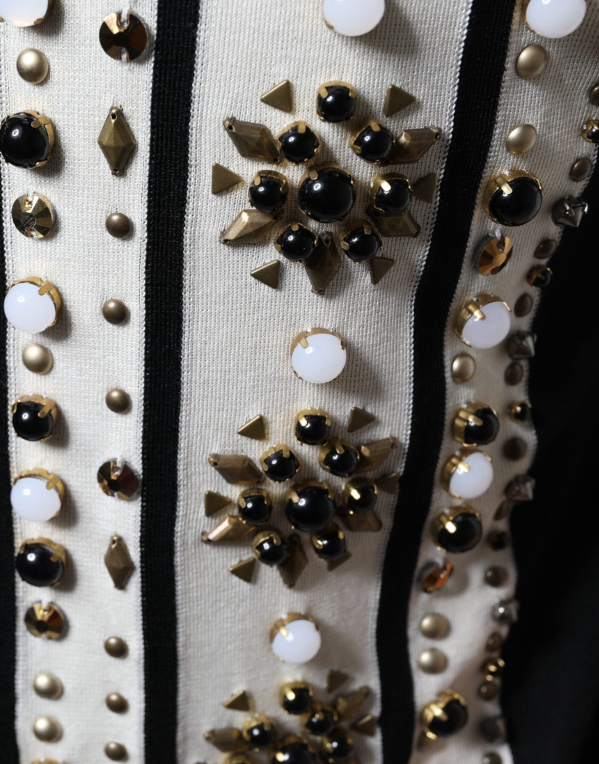 White and black silk shirt with studded stone and crystal embellishments by Dolce & Gabbana.
