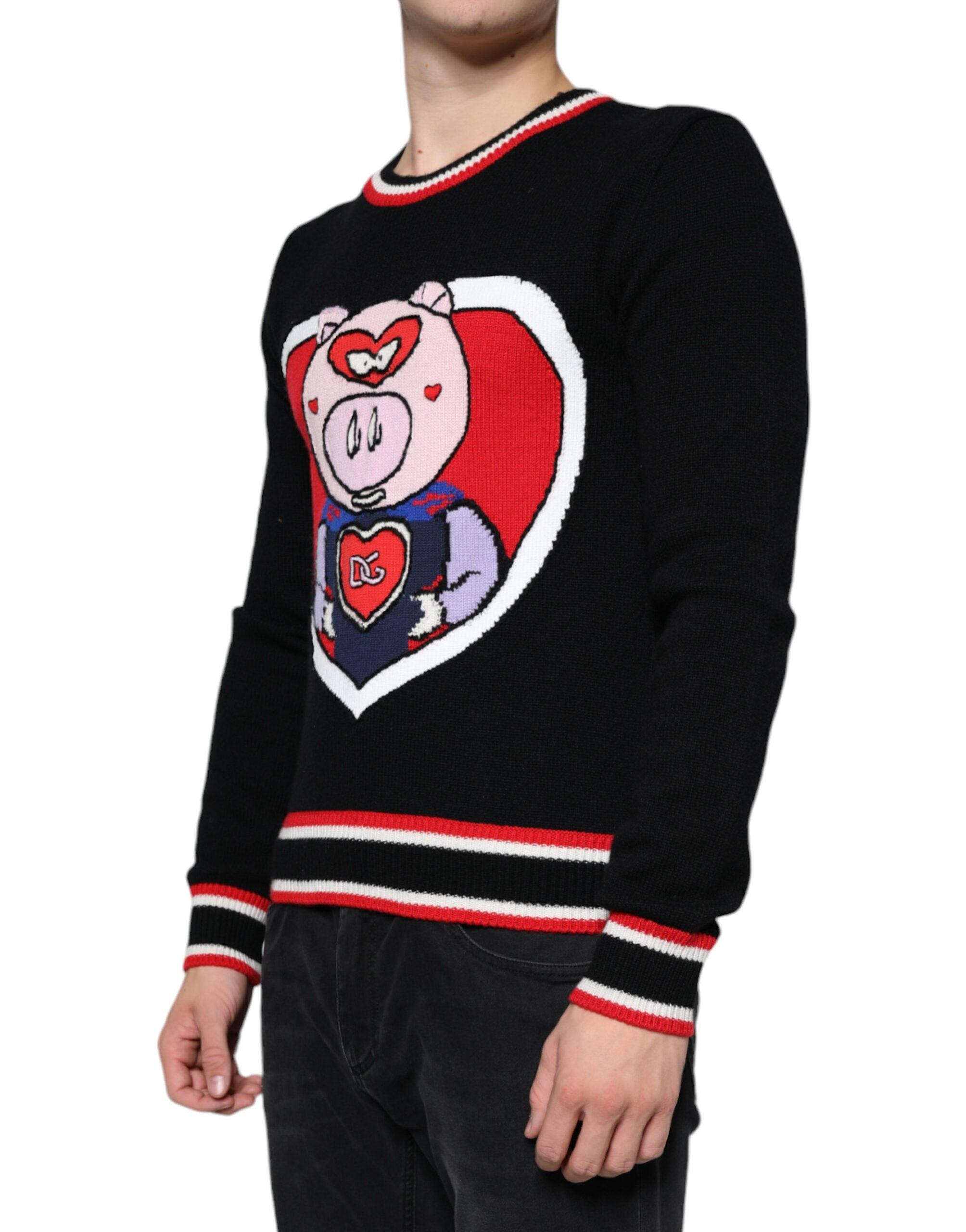 Black cashmere pig of the year Dolce & Gabbana pullover sweater showing a cozy, detailed knit design on a black background.