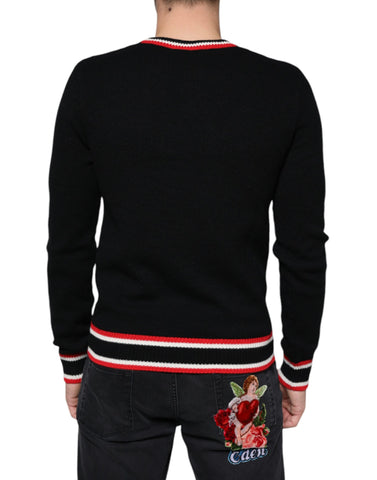 Black cashmere pig of the year Dolce & Gabbana pullover sweater with ribbed cuffs and neckline, featuring a playful pig motif.