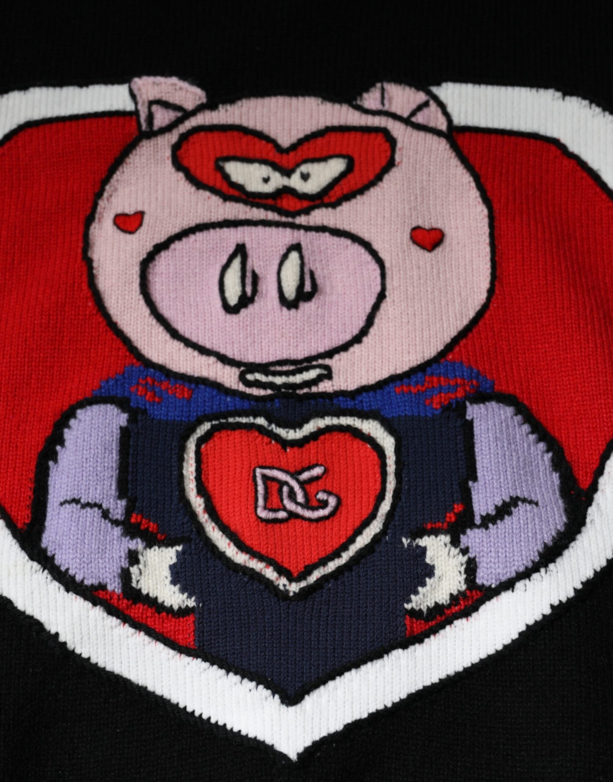 Black Dolce & Gabbana cashmere pig of the year pullover sweater with detailed pig embroidery on soft knit fabric.