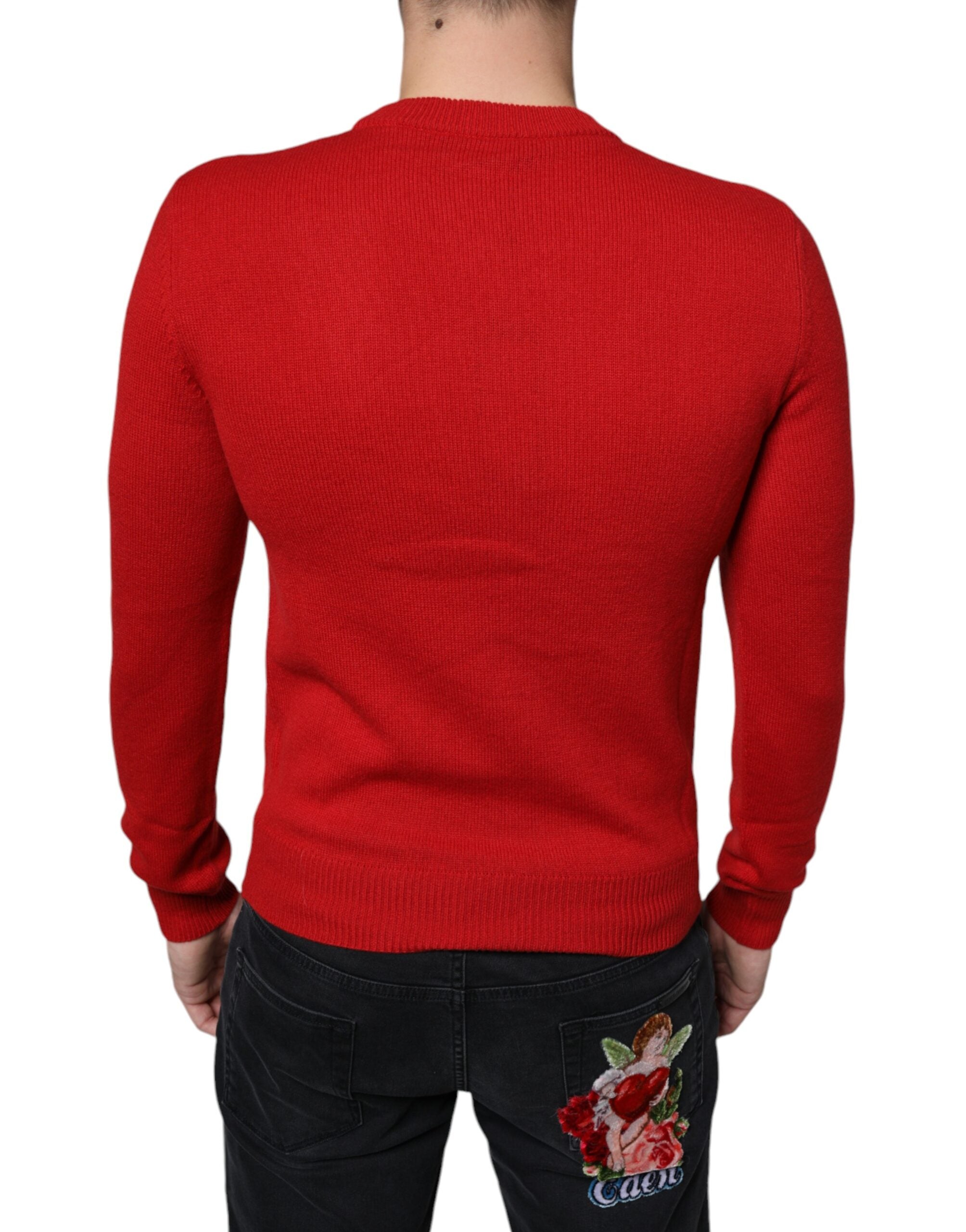 Red Dolce & Gabbana I'm The King wool crew neck sweatshirt with bold lettering and classic fit, displayed flat.