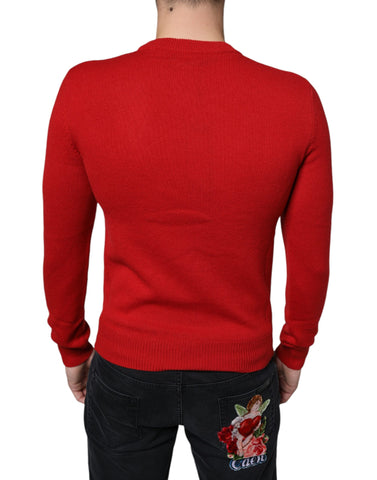 Red Dolce & Gabbana I'm The King wool crew neck sweatshirt with bold lettering and classic fit, displayed flat.