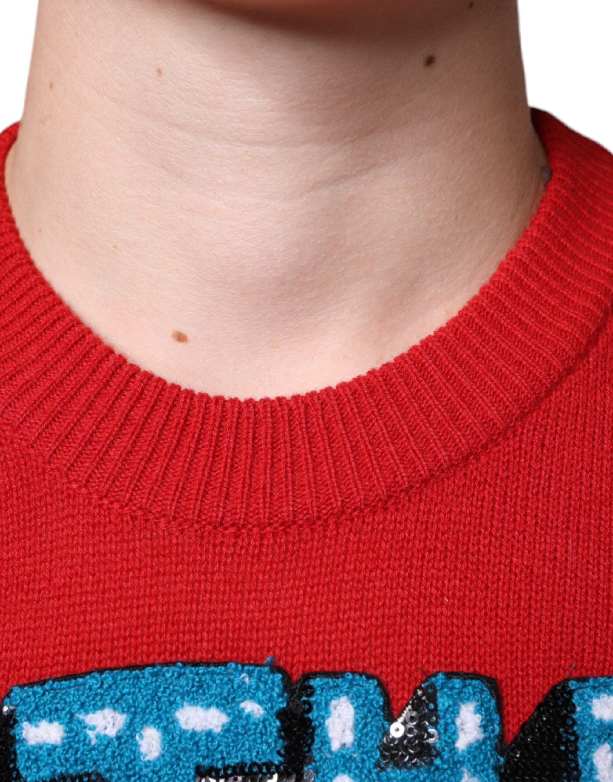 Red Dolce & Gabbana I'm The King wool crew neck sweatshirt showing the bold text design on the front.