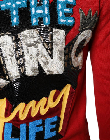 Red Dolce & Gabbana I'm The King wool crew neck sweatshirt with bold text design and ribbed collar and cuffs.