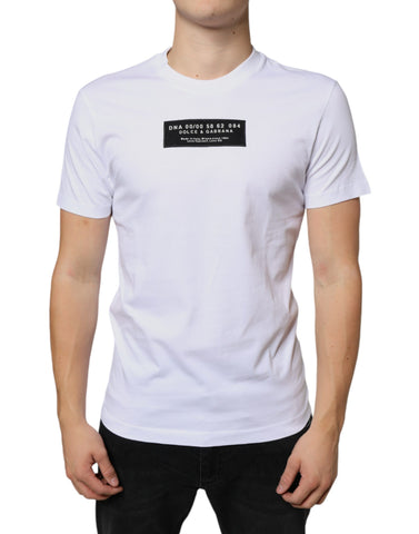 White cotton Dolce & Gabbana T-shirt with DG appliqué, casual style, soft fabric, and round neckline.