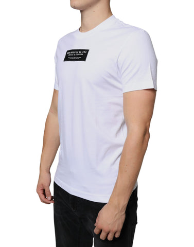 White cotton casual T-shirt with Dolce & Gabbana DG applique design, featuring a relaxed fit and soft fabric.