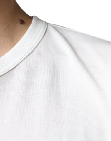 White Dolce & Gabbana cotton crewneck T-shirt with embossed logo front, casual style, and soft fabric.