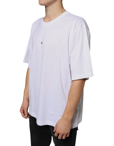 White cotton short sleeve T-shirt by Dolce & Gabbana with metal DG logo on front, casual and stylish design.