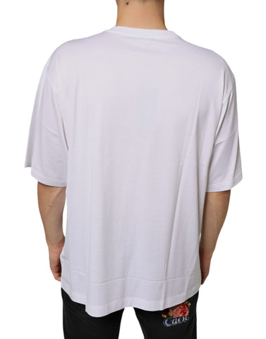 White cotton short sleeve T-shirt with Dolce & Gabbana DG logo in metal detail on front.
