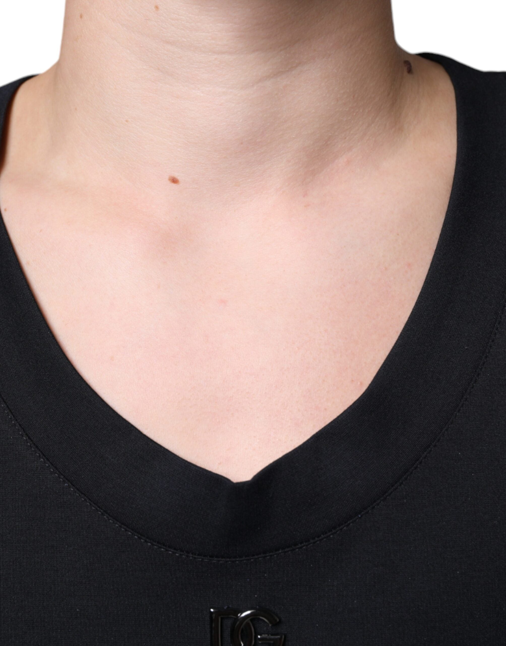 Black cotton sleeveless T-shirt by Dolce & Gabbana with "Born To Be Free" graphic design on the front.
