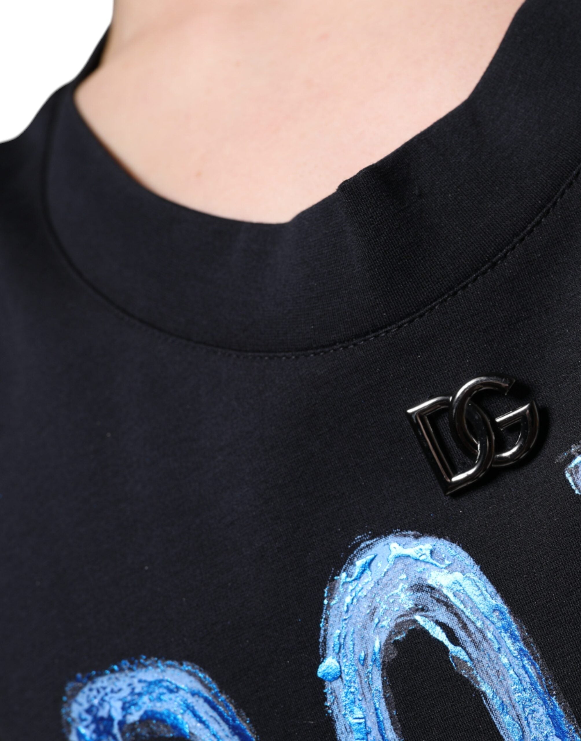 Black cotton sleeveless T-shirt by Dolce & Gabbana with "Born To Be Free" printed slogan on front.