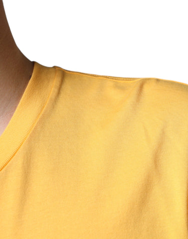 Yellow floral cotton crew neck T-shirt by Dolce & Gabbana with secret garden print, casual and stylish for everyday wear.