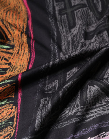 Multicolor graphic print cotton T-shirt by Dolce & Gabbana, featuring vibrant design and casual fit.